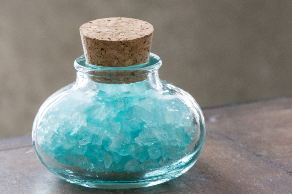 If you're hosting a viewing party, use small jars (this is from World Market, $2.00) filled with blue rock candy as decorations.