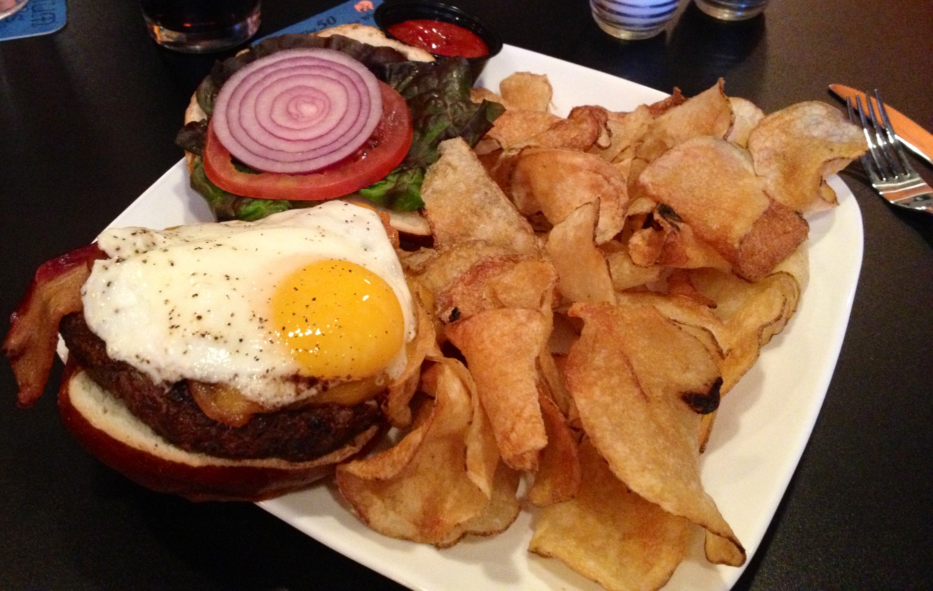 The Famous Kuma Burger The Famous Kuma Burger: Medium-rare patty, bacon, and fried egg.